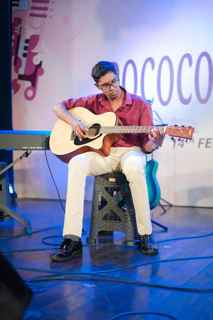Playing guitar